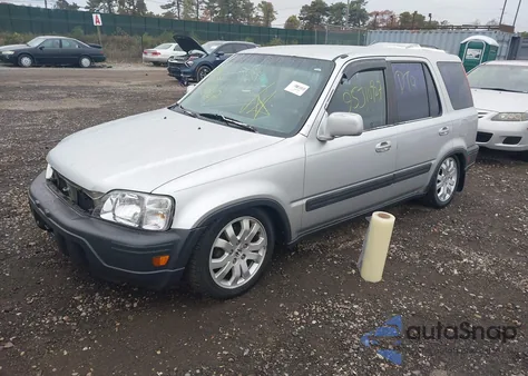 1999 Honda Cr-V Ex z USA, uszkodzony, nr VIN JHLRD1863XC074387